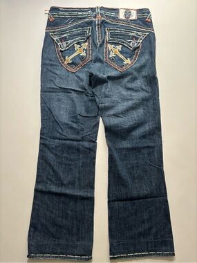 Y2K Rare laguna beach cross dagger jeans ( rips were made like that)